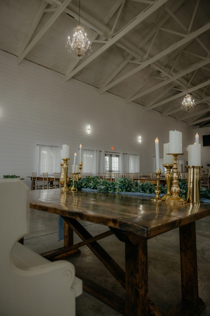 A sweetheart table setup with a small, intimate table for two